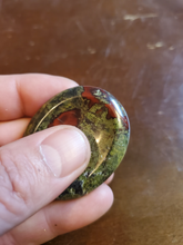 Load image into Gallery viewer, Dragon Bloodstone is mined in South Africa. Legend says the stone is the remains of deceased ancient dragons; the green being the skin and the red being the blood.