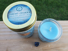Load image into Gallery viewer, About the Throat Chakra Candle....  Throat Chakra  Location – Center of throat or neck Purpose – Communication, Self-Expression of feelings, Speaking the truth, holding secrets Element – Ether or sound Crystal – Sodalite or Angelite Affirmation – I am speaking clearly and truthfully with grace and ease.” Oils – Peppermint, Hyssop, Eucalyptus, Rosemary Throat – Sodalite (Soy)  Sodalite encourages rational thought, objectivity, truth, and intuition, along with verbalization of feelings. It brings emotional ba
