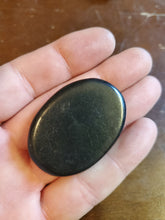 Load image into Gallery viewer, Shungite is a black stone with properties helping one who requires assistance in cleansing, healing, purification of the mind, body, and soul. First discovered from a deposit in remote Russia and is a carbon filled stone. Shungite is said to kills bacteria and viruses.