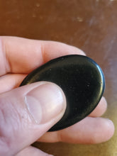 Load image into Gallery viewer, Shungite is a black stone with properties helping one who requires assistance in cleansing, healing, purification of the mind, body, and soul. First discovered from a deposit in remote Russia and is a carbon filled stone. Shungite is said to kills bacteria and viruses.