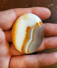 Load image into Gallery viewer, Carnelian is a stabilizing stone that restores vitality and motivation, and stimulates creativity. It gives courage, promotes positive life choices, dispels apathy and motivates for success. Carnelian is useful for overcoming abuse of any kind. It helps in trusting yourself and your perceptions.