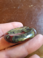 Load image into Gallery viewer, Dragon Bloodstone is mined in South Africa. Legend says the stone is the remains of deceased ancient dragons; the green being the skin and the red being the blood.