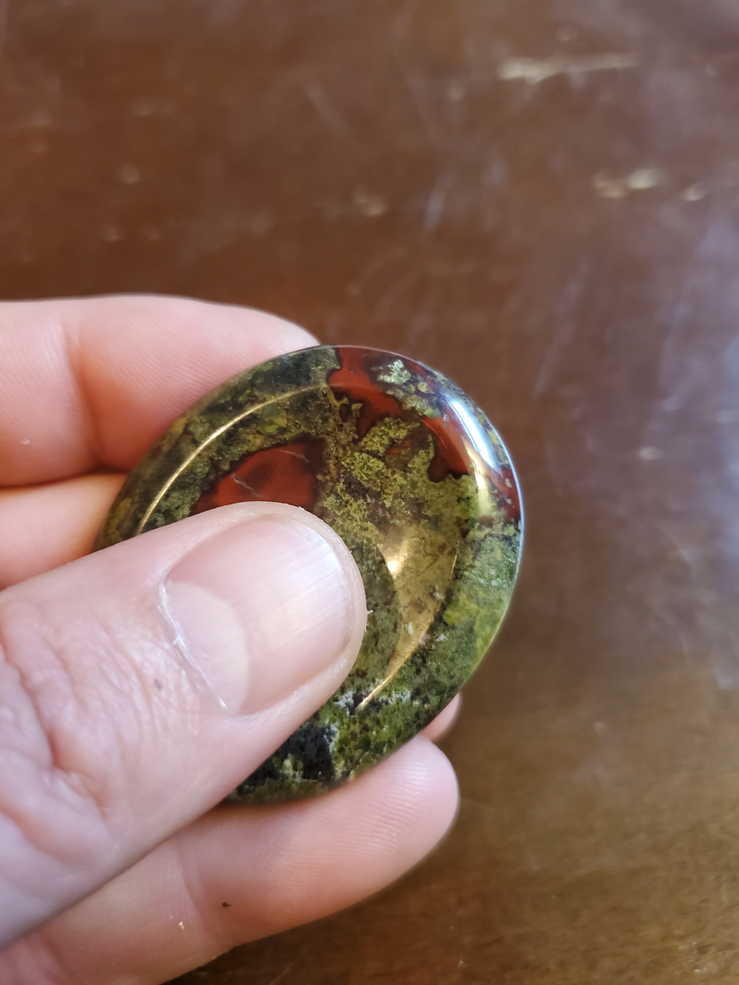 Dragon Bloodstone is mined in South Africa. Legend says the stone is the remains of deceased ancient dragons; the green being the skin and the red being the blood.